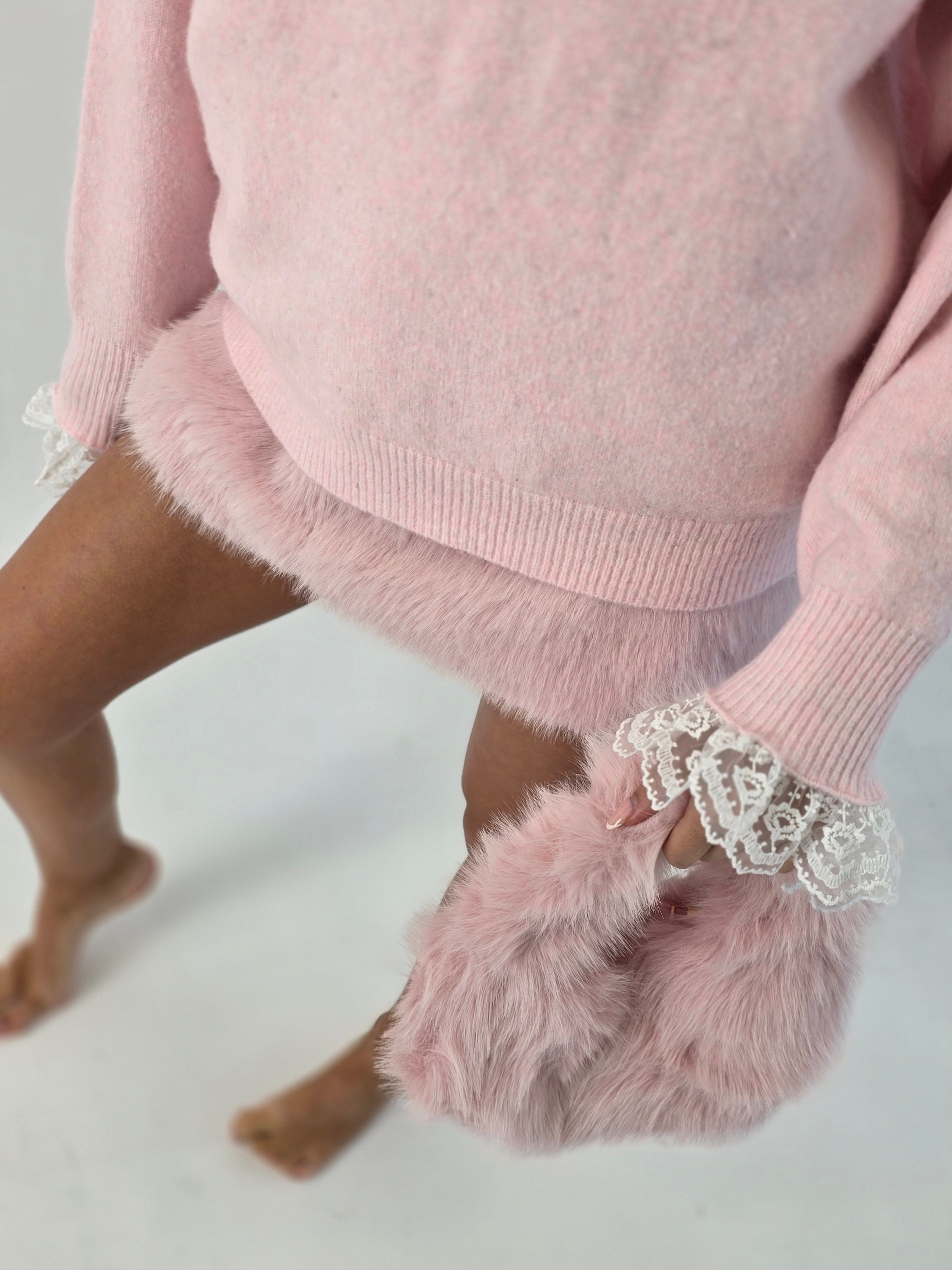 Emyra fur mini skirt