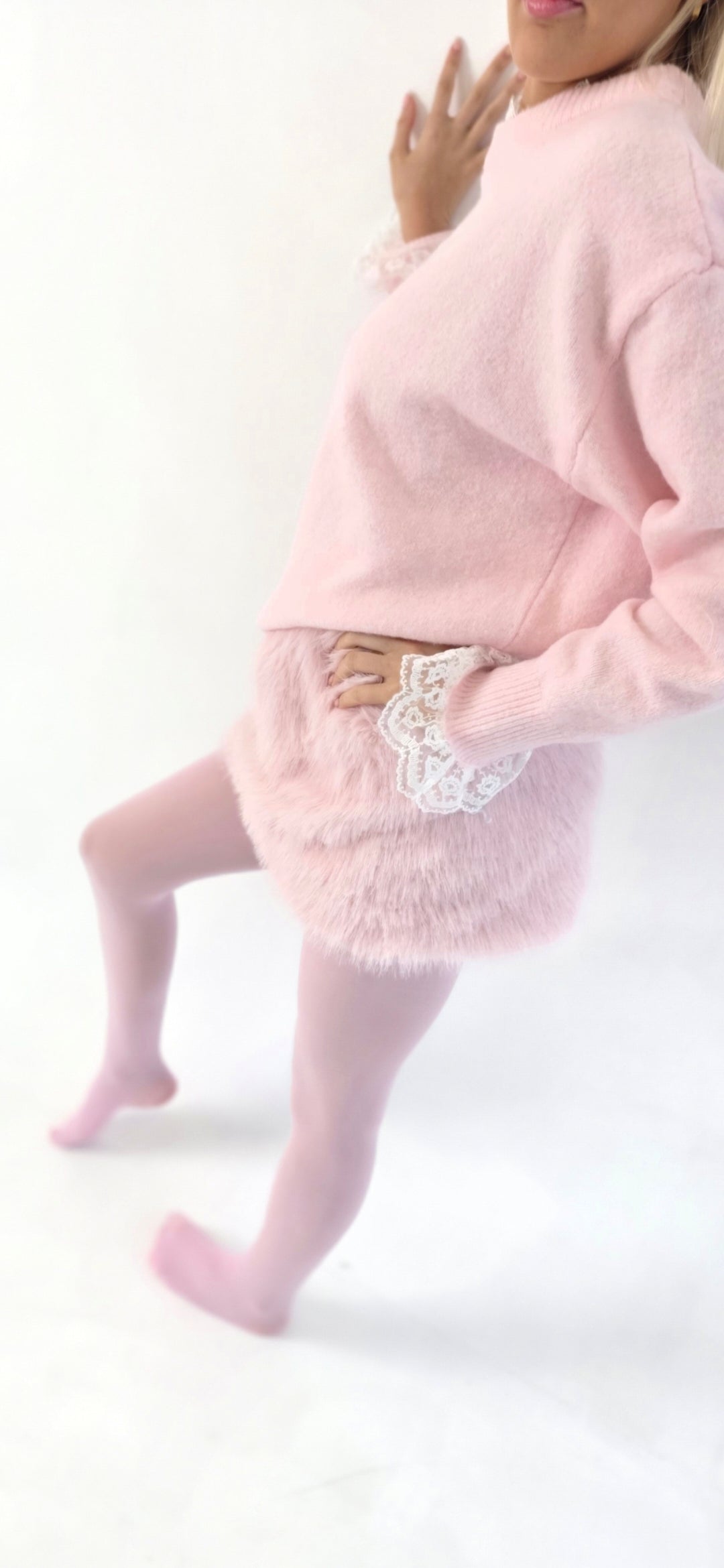 Emyra fur mini skirt