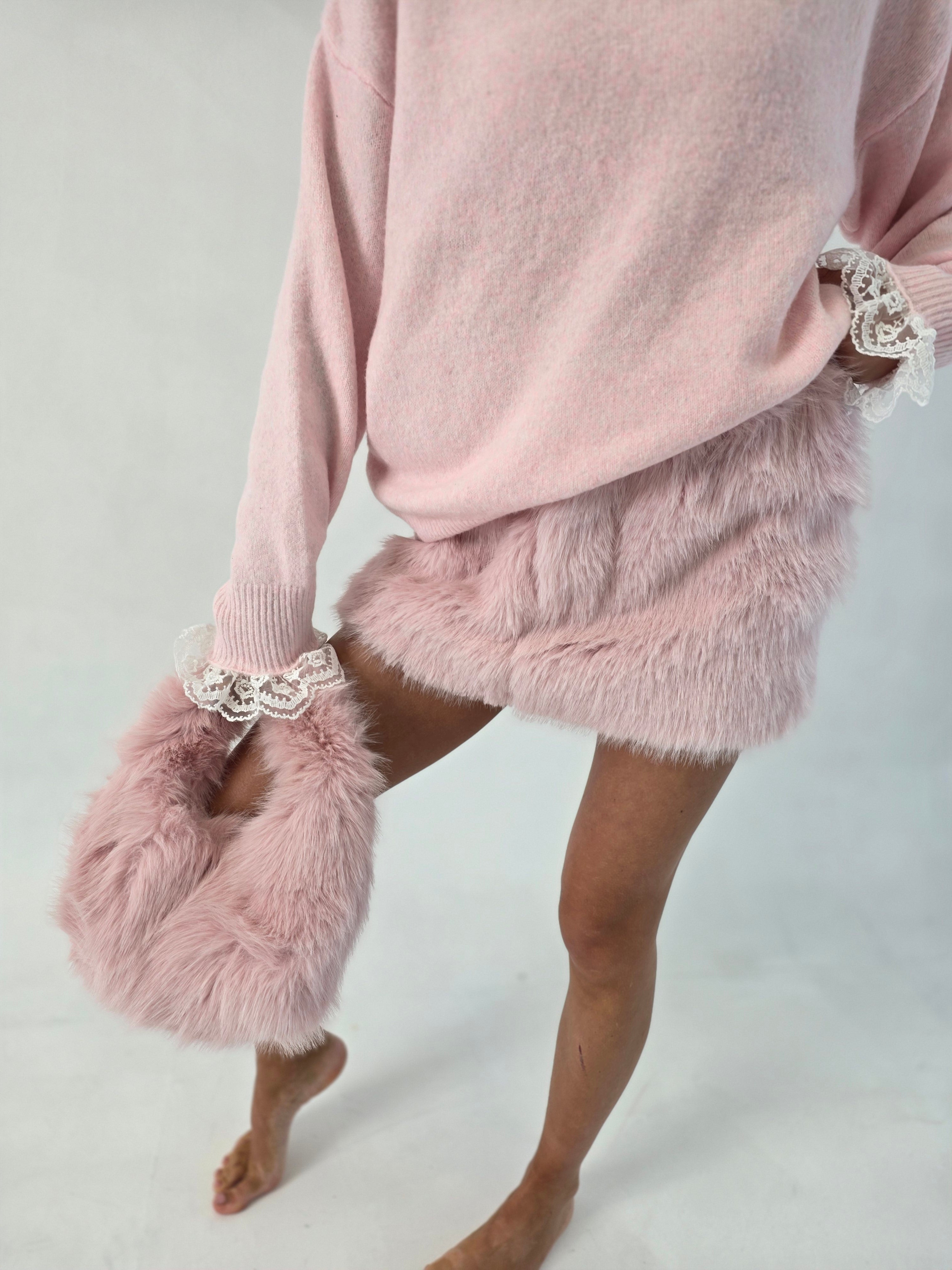 Emyra fur mini skirt