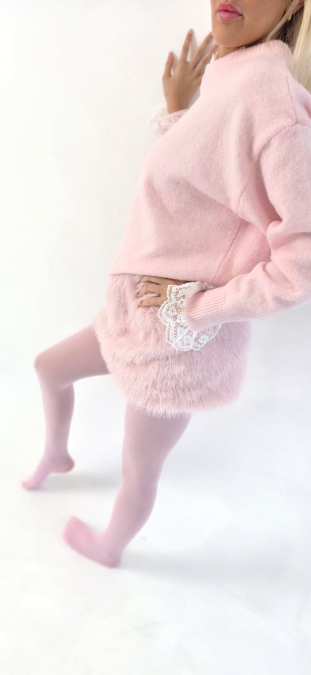 Emyra fur mini skirt